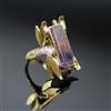 Dragonfly Ring photo. 18k yellow gold structures in the design of a delicate dragonfly, its body contains diamonds on the sides of the ring, and on top is a gorgeous purplish fluorite. So  gentle and graceful!
