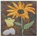 a fabric panel with a little yellow chick standing under a yellow daisy. The chick is dancing on top of two eggs!