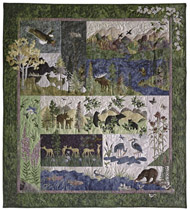 Complete At Home in the Woods quilt with birds, deer, bears, wildflowers, fish, and moose.