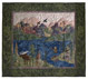 Quilt block of a man fishing in a river in the mountains, watched by an elk, with geese flying overhead.