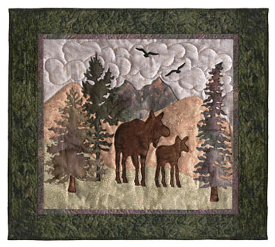 Quilt block of a mama and baby moose in the mountains.