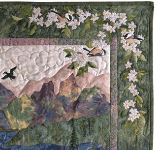 Quilt border with chickadees and cherry blossoms.