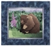 Quilt block of a mama bear and her cub watching butterflies drink from a Fireweed bloom.