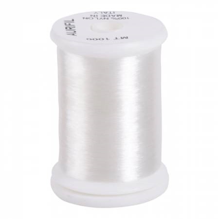 A spool of Aurifil Monofilament thread.