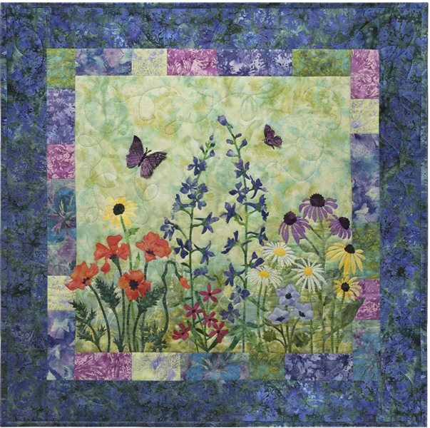 Quilt block showing wildflowers and butterflies.