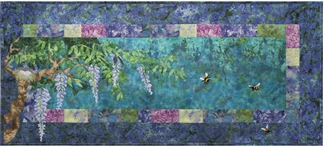 Quilt block showing wisteria blossoms and bees