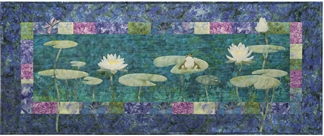 Quilt block showing frog in a pond with lily pads
