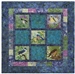 Pieced quilt block with appliqued morning birds.