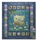 Image of full quilt based on of English garden, with birds, flowers, and a pond.