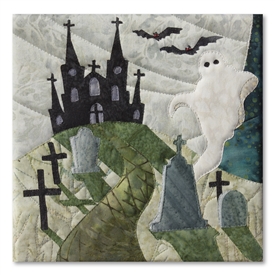 Quilt block of a ghost rising from behind a tombstone in a graveyard, with a spooky haunted house in the background, beneath a huge moon