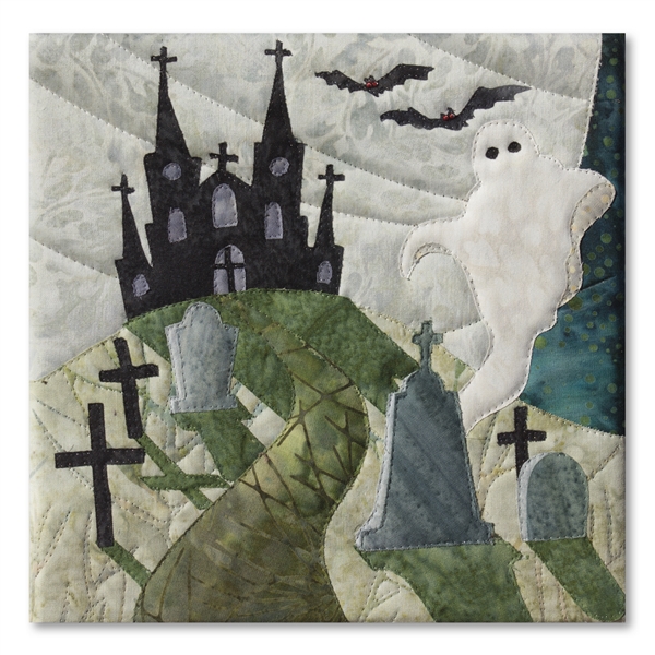 Quilt block of a ghost rising from behind a tombstone in a graveyard, with a spooky haunted house in the background, beneath a huge moon
