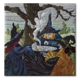 Quilt block of three witches around a cauldron, raising spirits and discussing Eat, Pray, Love