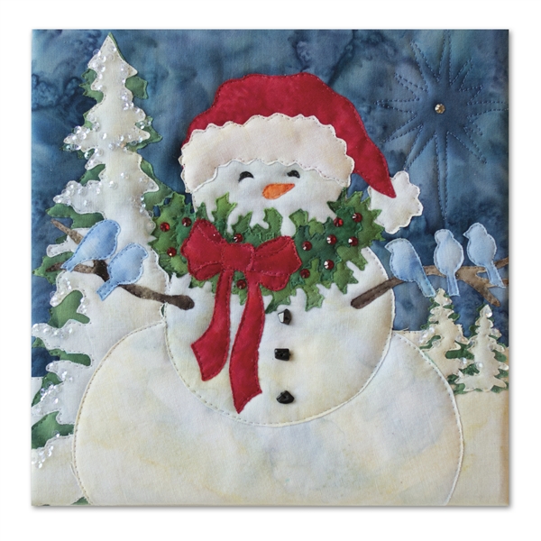 Quilt block of a snowman caroling with armfuls of blue birds