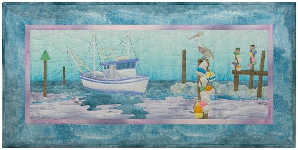 Quilt block of a fishing boat coming in to dock at the end of the day, supervised by a pelican.