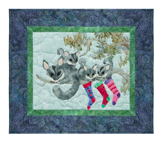 Quilt block of a family of sugar gliders hanging their stockings on the tree with care.