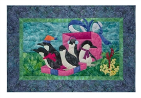 Quilt block of five penguins visiting the outback for Christmas, tumbling out of a present box.
