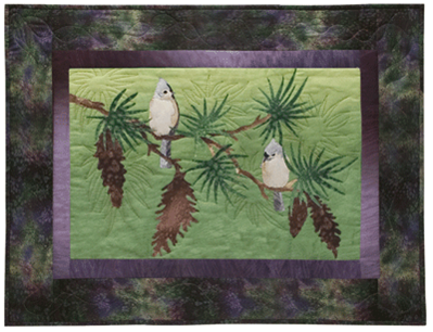 Quilt block of a titmouse being serenaded by her paramour, on the branch of a pine tree.