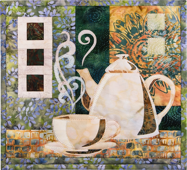 Quilt block of a beautiful coffee pot next to a steaming, fresh cup of coffee.