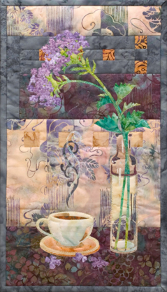 Quilt block of a steaming cup of coffee next to a vase to flowers.