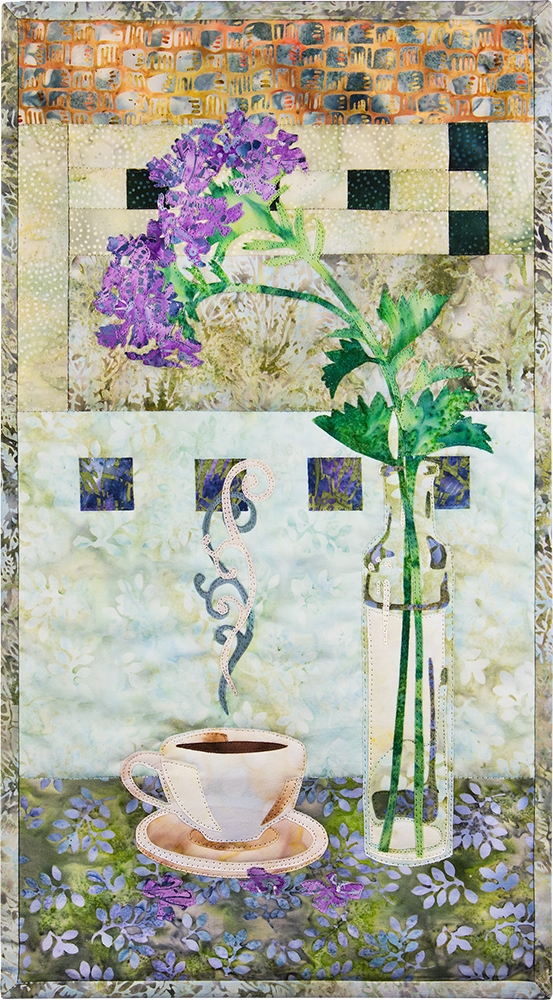 Quilt block of a steaming cup of coffee next to a vase to flowers.