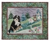 Quilt block of a Saint Bernard playing on the seesaw with three smaller dogs.