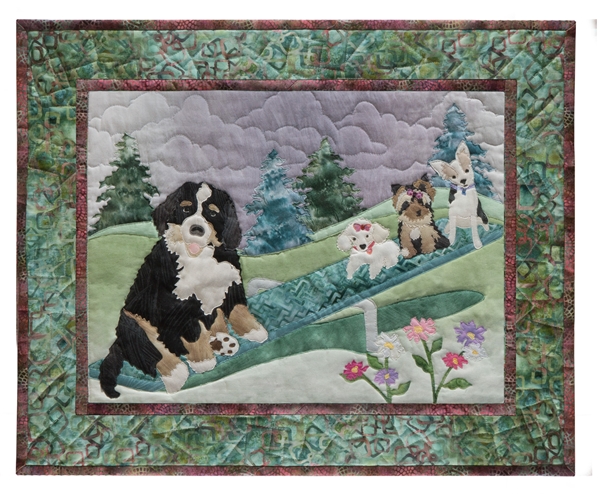 Quilt block of a Saint Bernard playing on the seesaw with three smaller dogs.