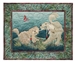 Quilt block of two dogs playing tug-of-war over a rope toy, on a picnic blanket.