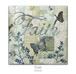 Quilt block with the word "Faith," stylized butterflies in ethereal floral patterns