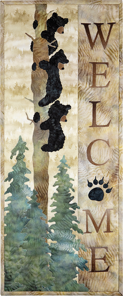 Three Bears hanging to a tree trunk overlook the words Welcome, a perfect quilt block for a cabin or woodland retreat