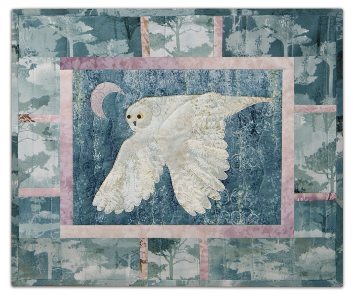 Quilt block of an owl on the hunt under the moon, inspired by the famous Rush song