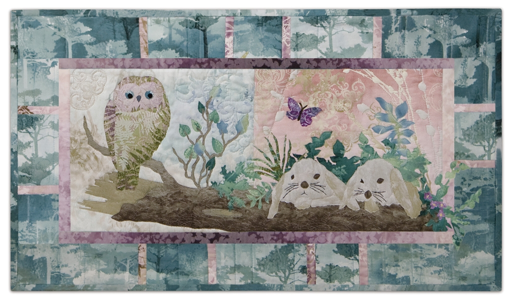 Quilt block of an owl resting on a log, near two nervous bunnies, while a butterfly flutters unconcerned