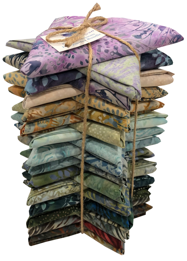 The complete set of 30 Seed to Blossom batiks, folded into fat quarters and bundled.