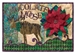 This quilt block is a play on words, as a moose drizzled with chocolate stands near a large, probably inedible, poinsettia.