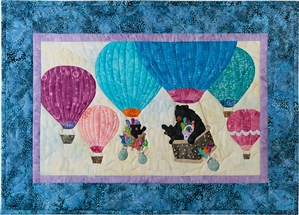 mama bear and her two babies floating in a group of hot air balloons, waving at each other! mama continues her mission collecting fabric.
