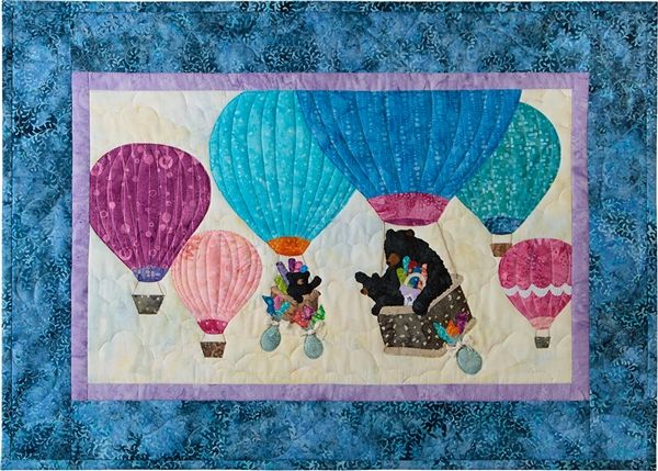 mama bear and her two babies floating in a group of hot air balloons, waving at each other! mama continues her mission collecting fabric.