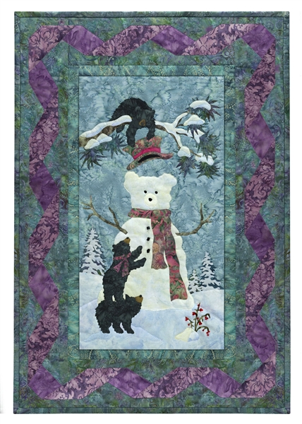 Quilt block of three black bear cubs making a snowman, complete with scarf and magic hat.