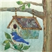 a fabric panel with a birdhouse and a bluebird