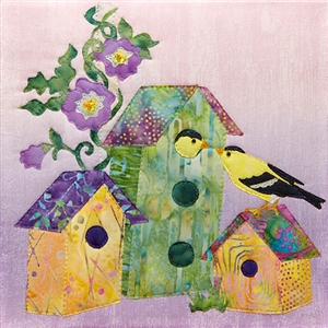 a fabric panel with a birdhouse and two finches