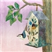 a fabric panel with a birdhouse