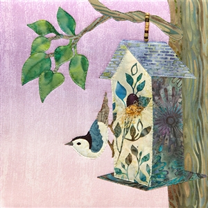 a fabric panel with a birdhouse