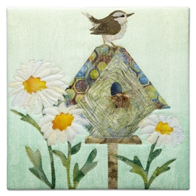 Quilt block of a wren on top of her house, hence the witty wordplay.