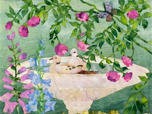 Quilt block of two dove making a splash in a bird bath.