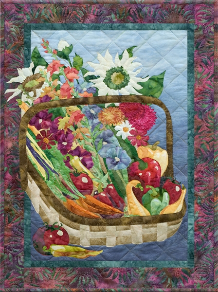 Quilt block of a basket of freshly harvested produce and flowers from an abundant garden.