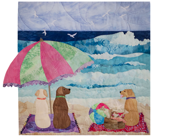 Three lucky dogs have a picnic on the beach.