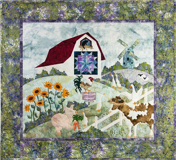 a farm scene with a pig, geese, a cow, a rooster, a barn cat, and sheep. There is a windmill on the hillside, a field of sun flowers and a quilt on the barn wall.