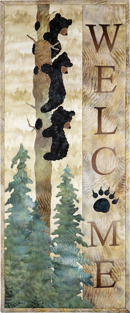 Three Bears hanging to a tree trunk overlook the words Welcome, a perfect quilt block for a cabin or woodland retreat