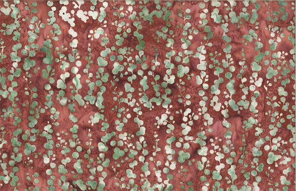Batik fabric print of string of pearls in desert red adobe