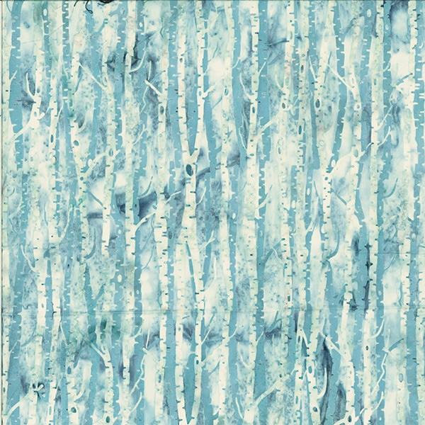 Batik fabric in birch tree print in light icy blue tones