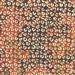 Batik fabric in leopard print in redish-brown and cream undertones