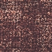 Batik fabric in leopard print in burgundy with pale peach undertones